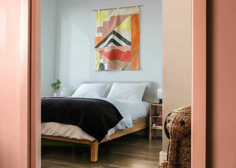 View into a bedroom with bed.