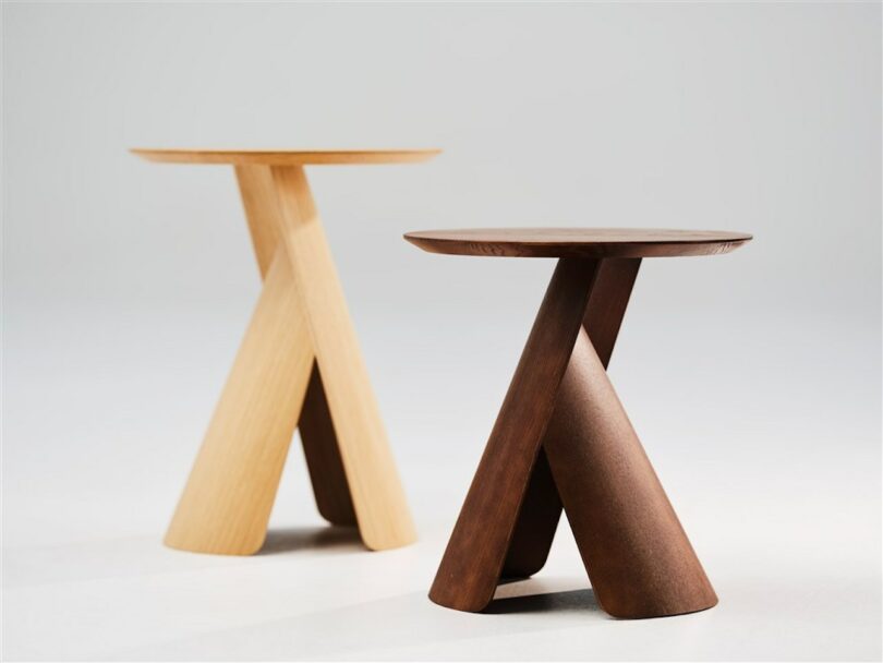 two wooden coffee tables in grey room