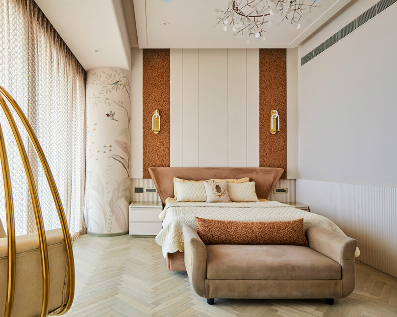 Modern bedroom interior featuring elegant decor and a plush bed.